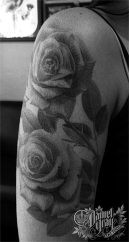 rose sleeve tattoo by cincinnati artist Daniel Gray