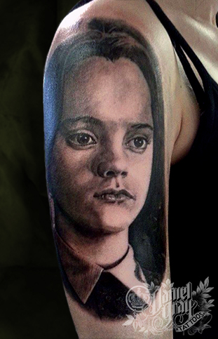 Wednesday Addams Family portrait tattoo by cincinnati artist Daniel Gray