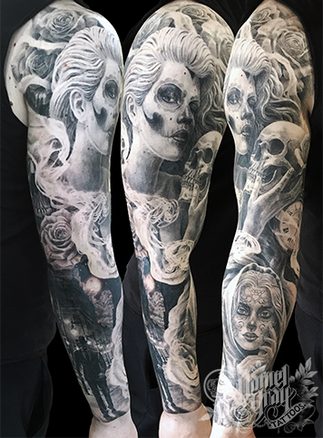 Day of the dead silhouetted man walking city street,  tattoo by cincinnati artist Daniel Gray