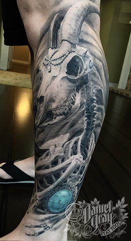 Goat skeleton on lower leg, tattoo by cincinnati artist Daniel Gray